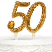 gilded 50th anniversary cake pick
