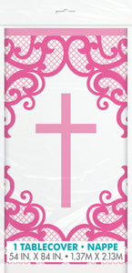 pink and white plastic tablecloth with cross