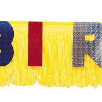 yellow fringe happy birthday banner with multicolored letters
