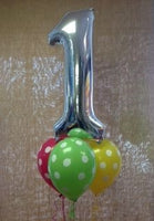 Foil number balloon and some latex helium balloons
