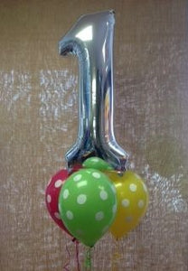 Foil number balloon and some latex helium balloons