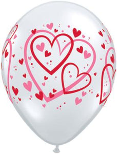 11" clear balloon with red and pink heard pattern